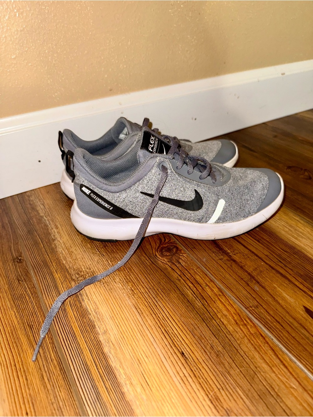 Nike Gray Knit Running Shoes with Black Swoosh